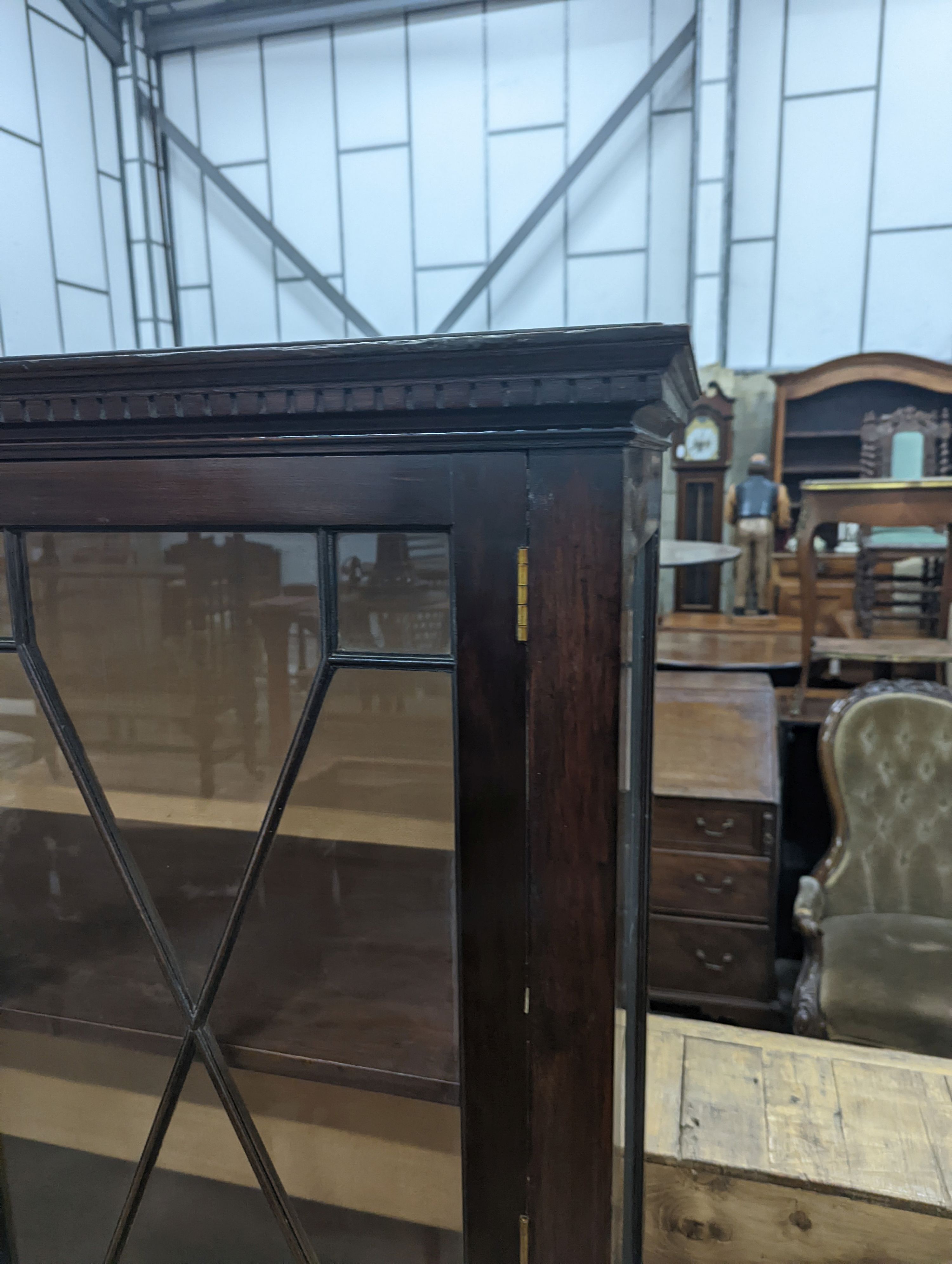 A reproduction George III style glazed mahogany two door display cabinet, width 108cm, depth 40cm, height 172cm